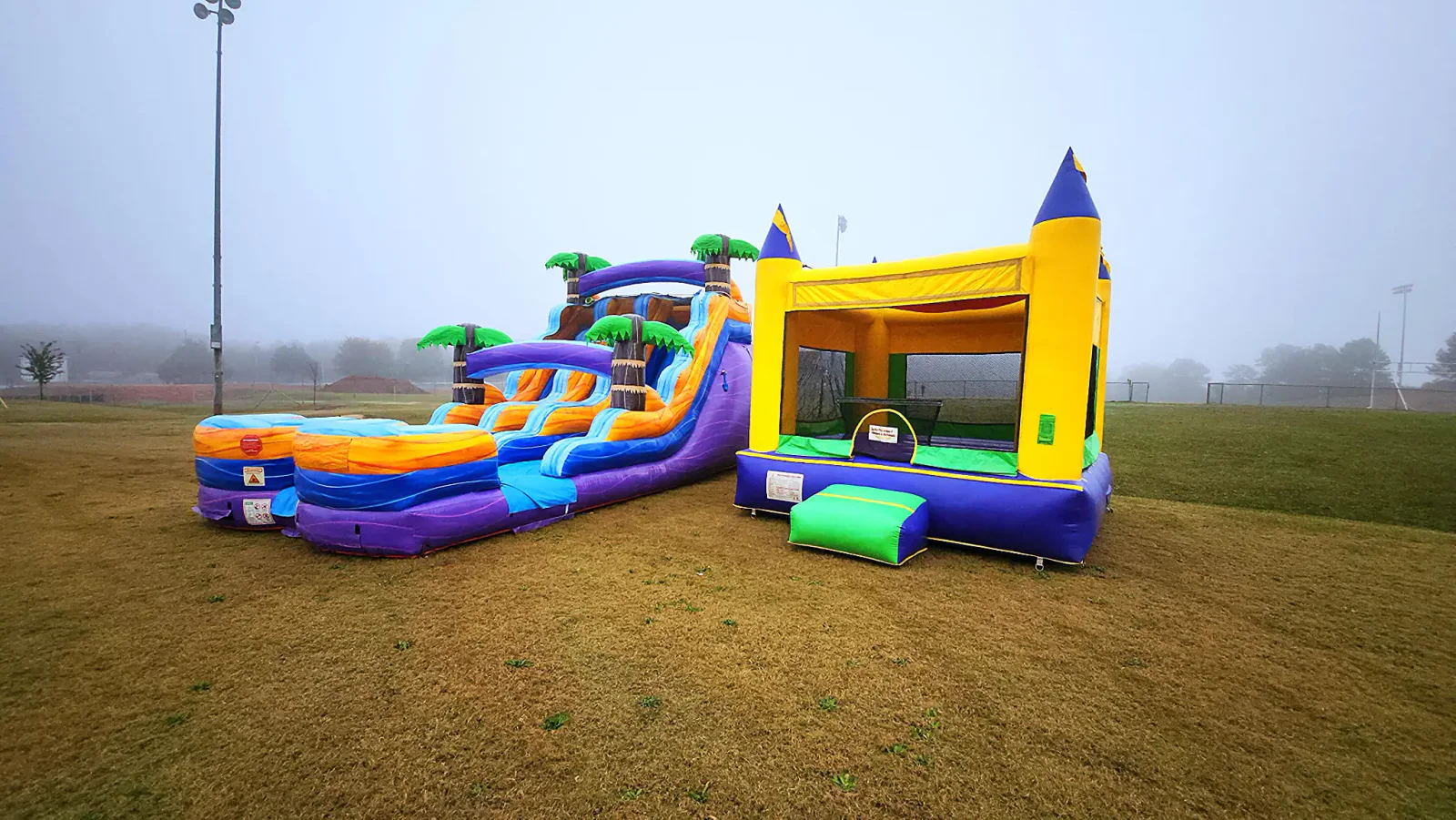 Wow Inflatables inflatable bounce house rental at indoor school event in Georgia — Veteran-Owned party rental company