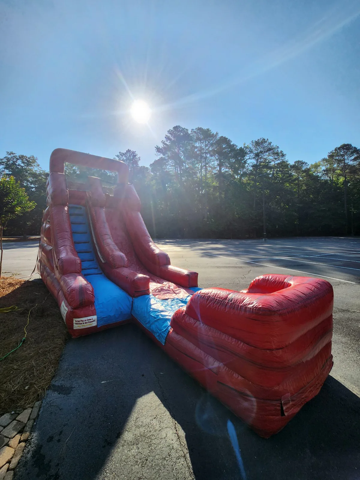 Wow Inflatables inflatable water slide rental at backyard party in Georgia — kids water slide with splash landing pool
