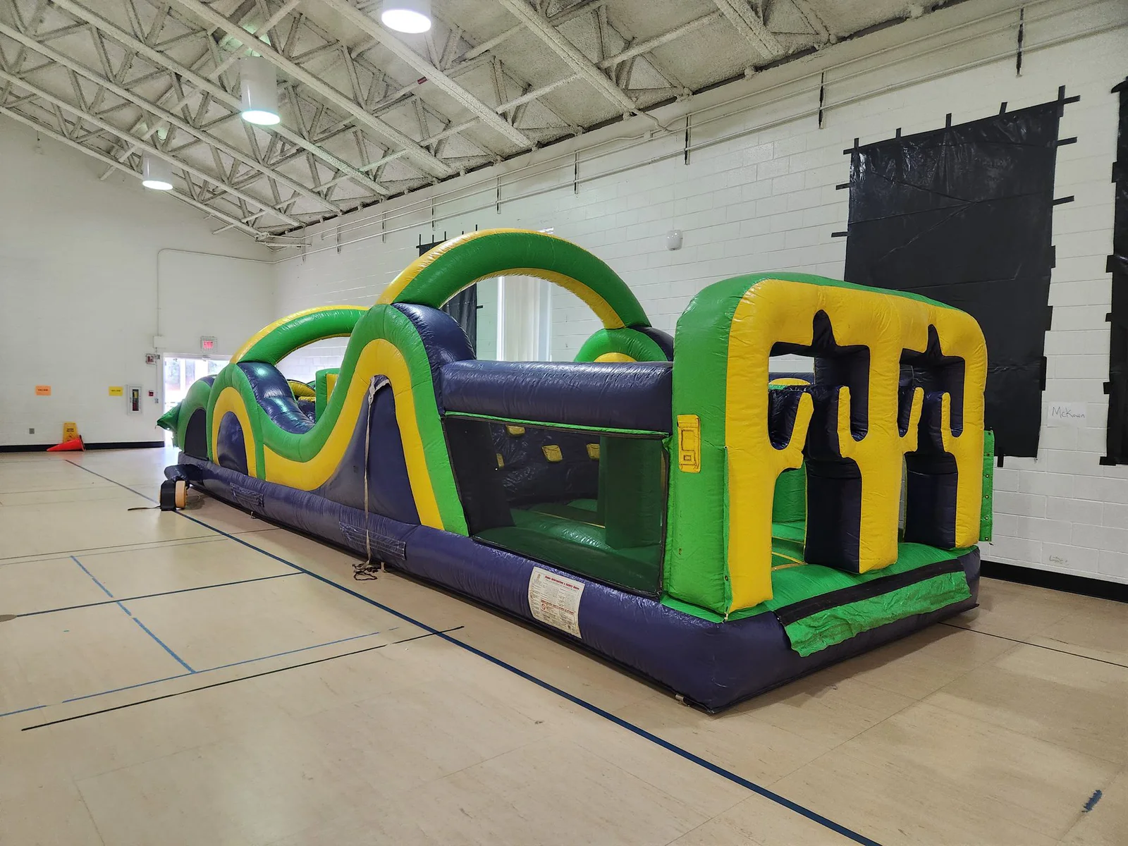 Wow Inflatables inflatable bounce house rental at outdoor party in Middle Georgia — bounce house setup at backyard birthday party
