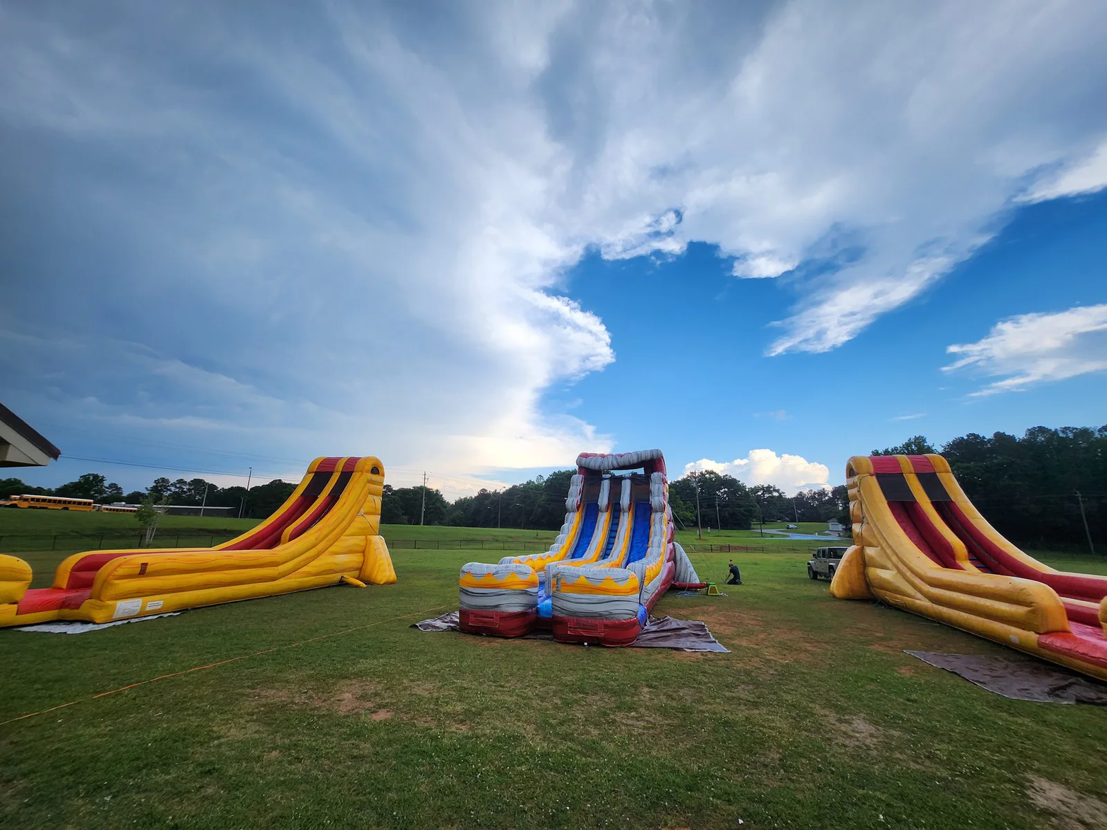 Wow Inflatables inflatable rental at party in Georgia — bounce house or water slide setup at birthday celebration or community event