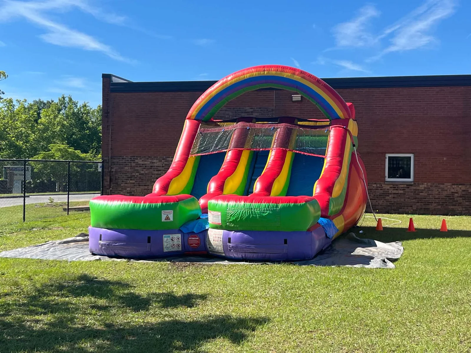 Wow Inflatables inflatable rental at fun outdoor party event in Georgia — bounce house or water slide at summer celebration