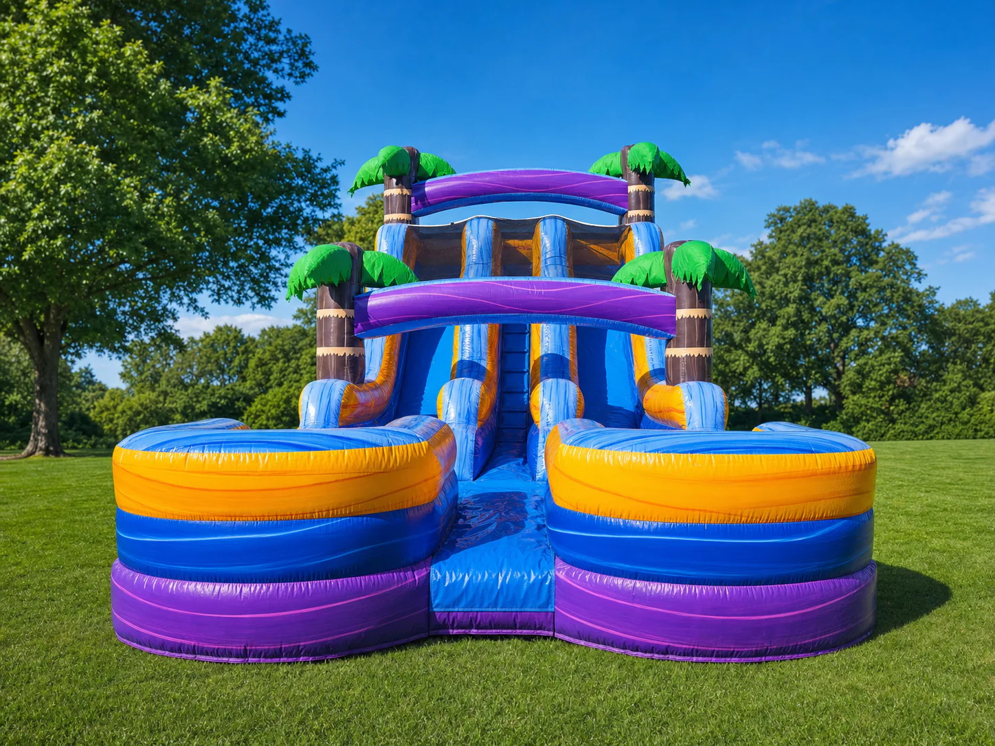 Wow Inflatables purple blue orange tropical dual lane inflatable water slide with palm trees and two splash pools rental at outdoor event in Georgia