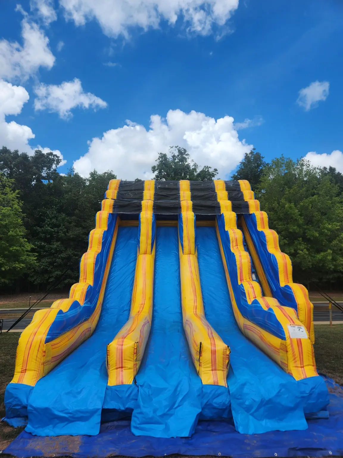 Actual Wow Inflatables Triple Lane Slide rental unit in Middle Georgia