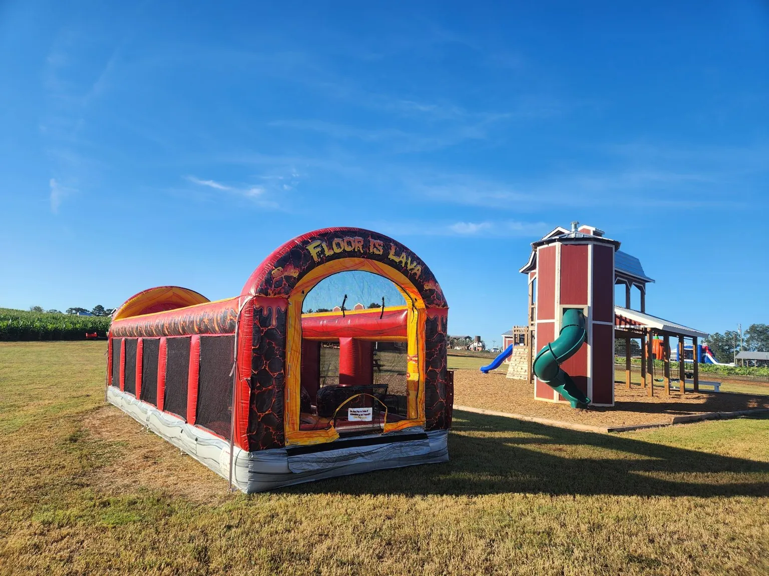 Wow Inflatables Floor is Lava obstacle course set up for an event